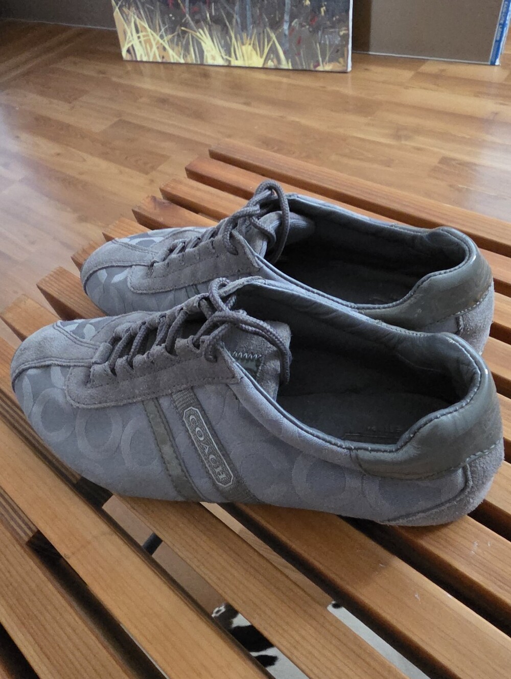 Coach Women's Kathleen sneakers feature the iconic grey signature "C" jacquard
